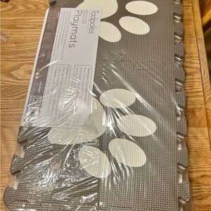 NWT paw print foam playmat